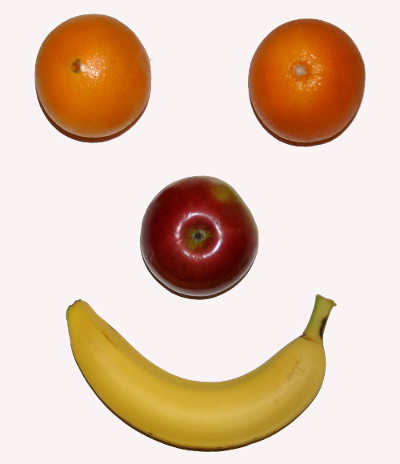 Face made from pieces of fruit