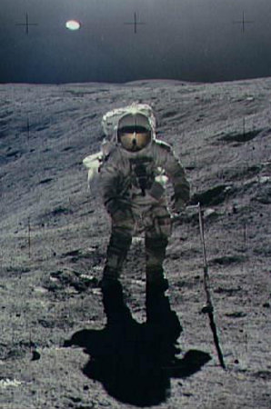 Apollo 16 astronaut standing on the moon